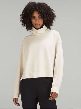 Lululemon Softstreme Turtleneck Pullover
Size 4 minimalist fall sweater